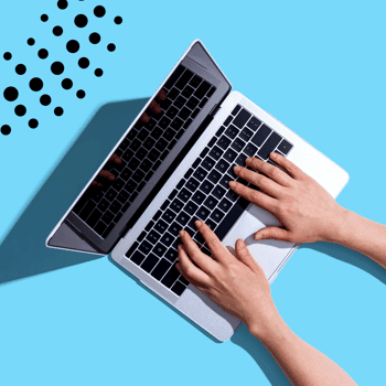 A blue background with a laptop opened and hands typing