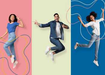 Three people jumping in the air with red, yellow and blue background